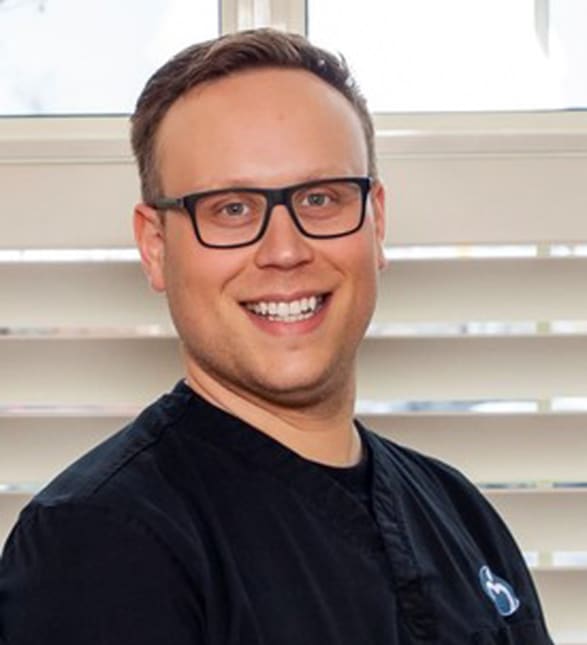 Dr. David D’Silva, Dentist in SKH Dentistry - Portrait Photo