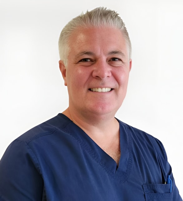 Dr. John McIntosh, Dentist in SKH Dentistry - Portrait Photo