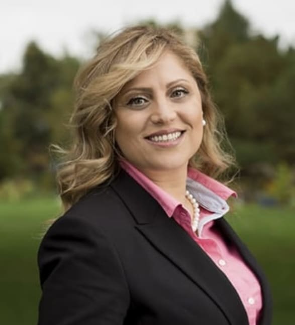 Dr. Rula Abdel-Kader, Dentist in Country Hills Dentistry - Portrait Photo