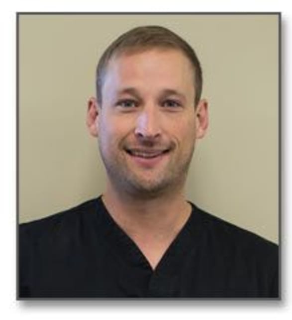 Dr. Tyler Hill, Dentist in Melfort Dental Group - Portrait Photo