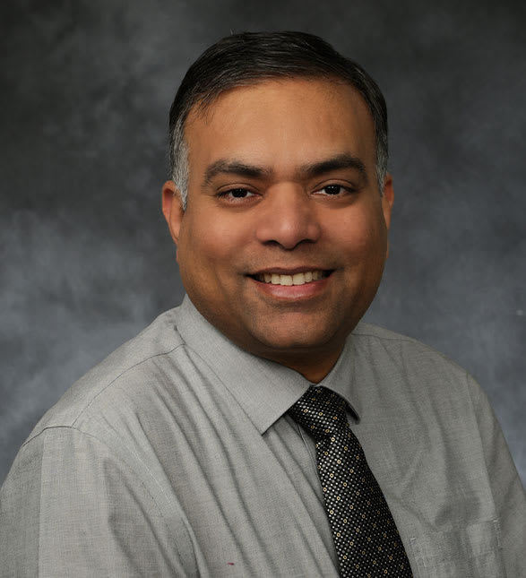 Dr. Vimal Sharma, Dentist at Highland Dental Centre - Portrait Photo