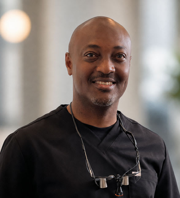 Dr. Benedict Chukwuma, Dentist at Hollinger Dental Group - Portrait Photo