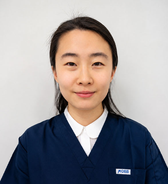 Dr. Yi Bo Hou, Dentist at Smile Dental Centre - Portrait Photo