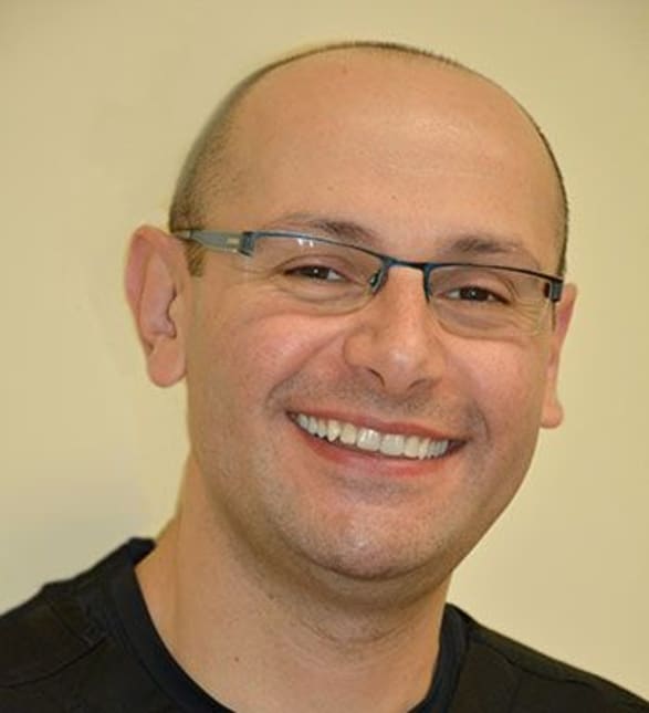 Dr. Ali Rabahi, Dentist in Parkland Dental - Portrait Photo