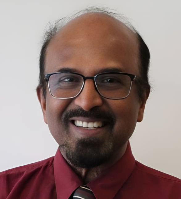 Dr. Hector Jothiraj, Dentist in Alderney Dental Group - Portrait Photo
