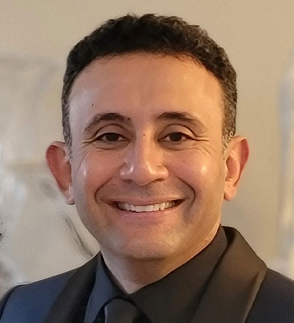 Dr. Micheal Nessim