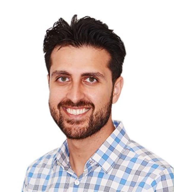 Dr. Faisal Assad, Dentist in West Market Dental - Portrait Photo