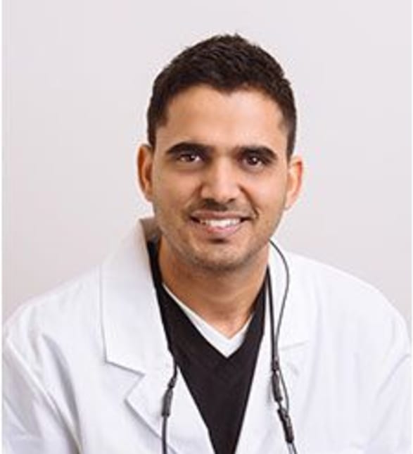Dr. Neeraj Singh, Dentist in Clayburn Dental - Portrait Photo