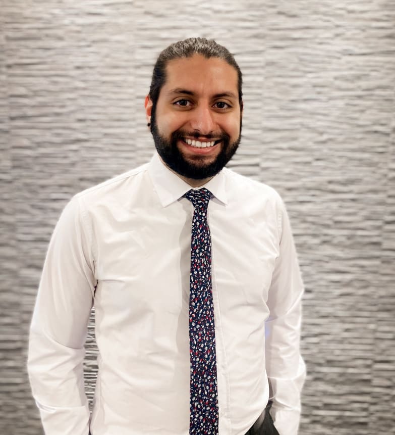 Dr. Rahbar, Dentist in Warmstone Family Dentistry - Portrait Photo