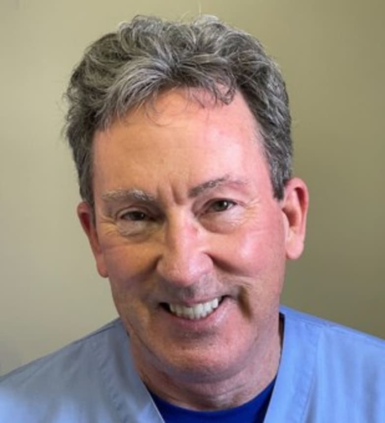 Dr. Denis Dwyer, Dentist in Monarch Dental - Portrait Photo