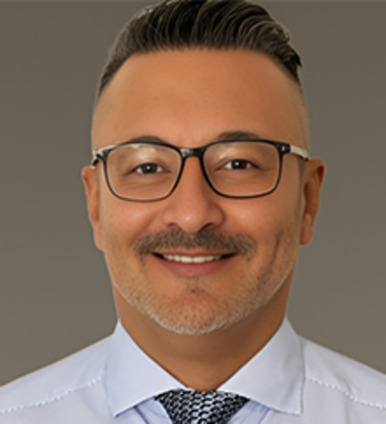 Dr. Walter Herrador, Dentist in Reflections Dental Health Centre - Portrait Photo