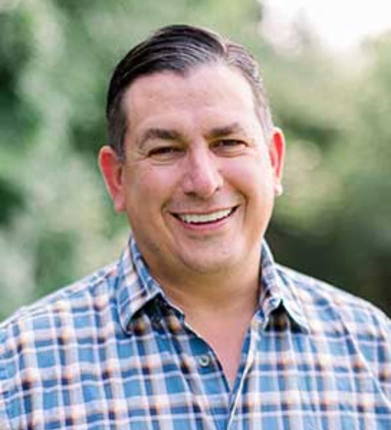 Dr. Nick Douvis, Dentist in River Dental - Portrait Photo