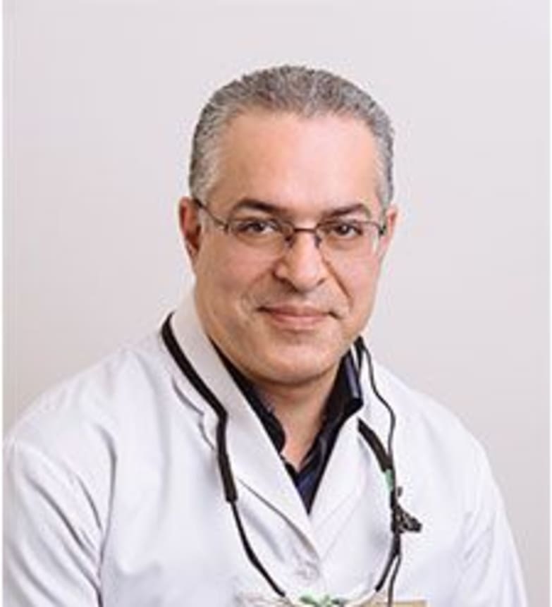 Dr. Alireza Amirbeigi, Dentist in Clayburn Dental - Portrait Photo