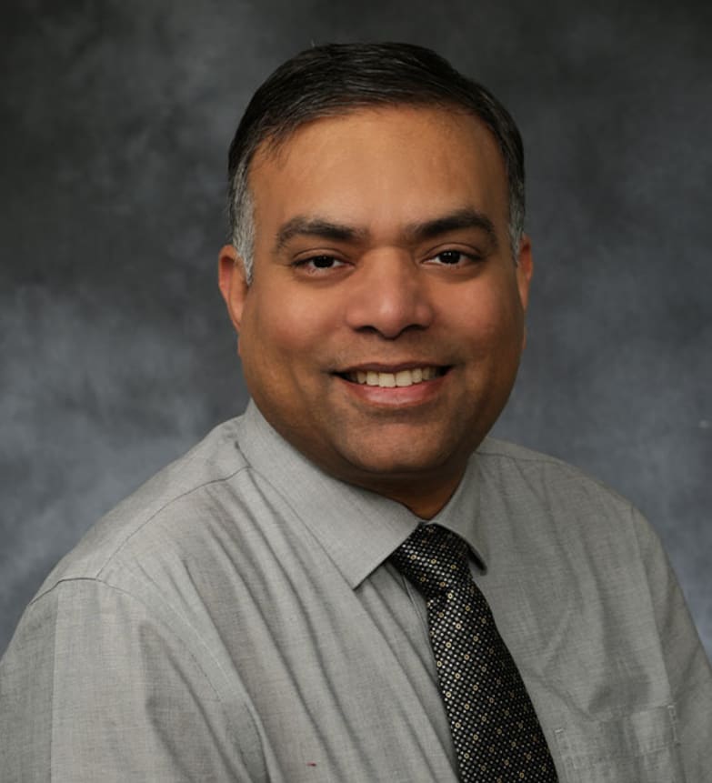 Dr. Vimal Sharma, Dentist in Highland Dental Centre - Portrait Photo