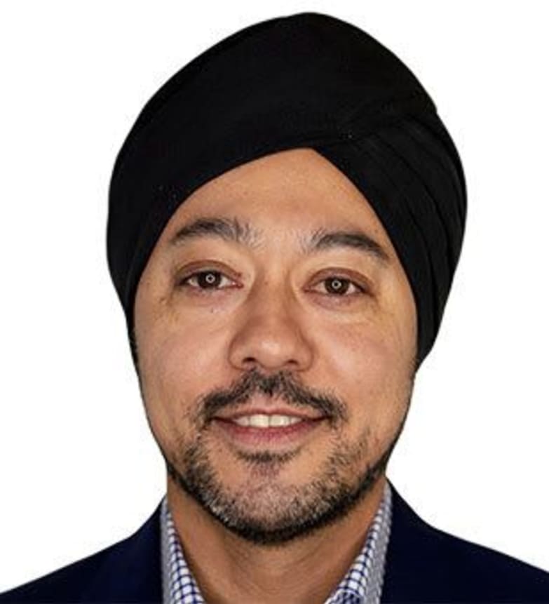 Dr. Amarjit Rihal, Dentist in Assiniboine Dental Group - Portrait Photo