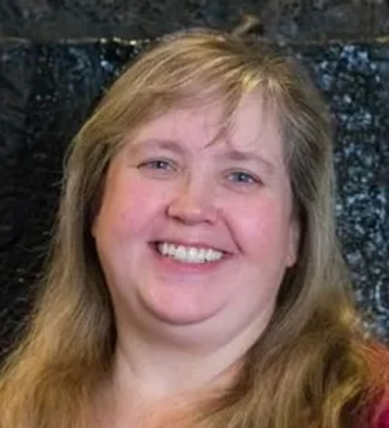 Dr. Lesia Kulbaba, Dentist in LifeSmiles Dental - Grant Park Mall - Portrait Photo