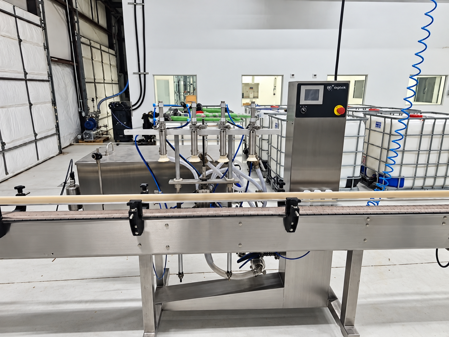 Equitek 4-Nozzle Filling Machine