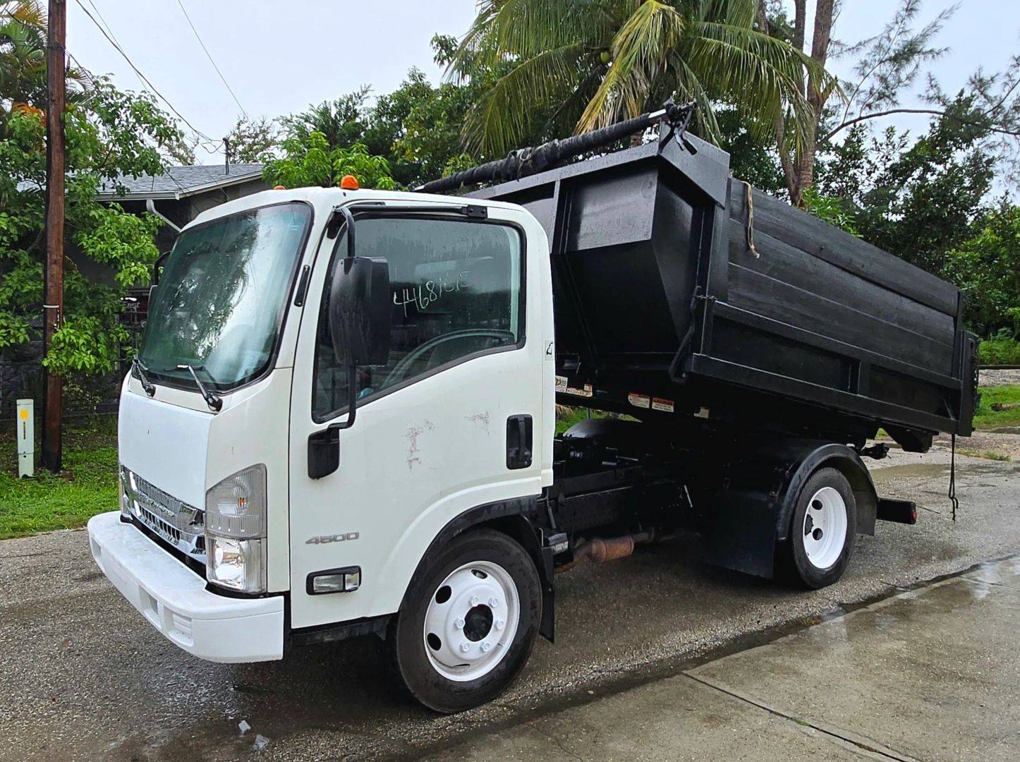 2015 Isuzu NPR Rollback Truck