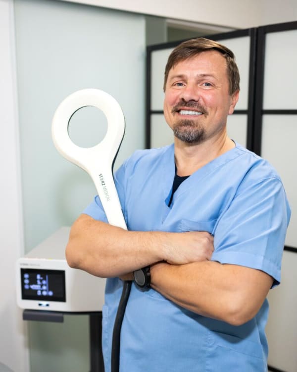 Dr. Roman Magas