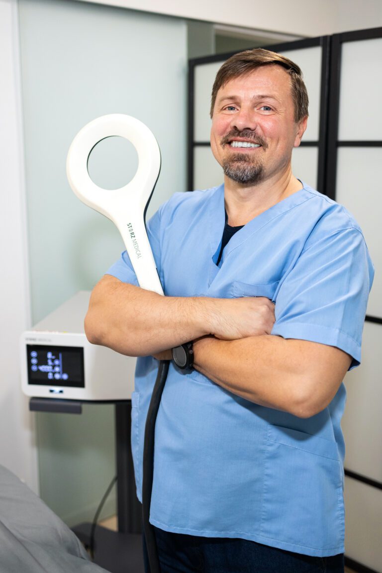 Dr. Roman Magas