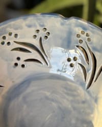 Bowl styled with fruit inside demonstrating use