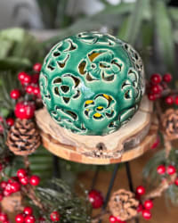 Lantern unlit showing the sphere form and green glaze