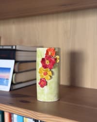 Side angle showing the full height and floral coverage