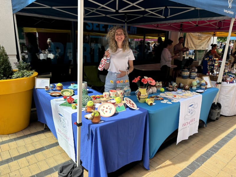 The InchyArt stall at an artisan market in London, with handmade ceramics on display