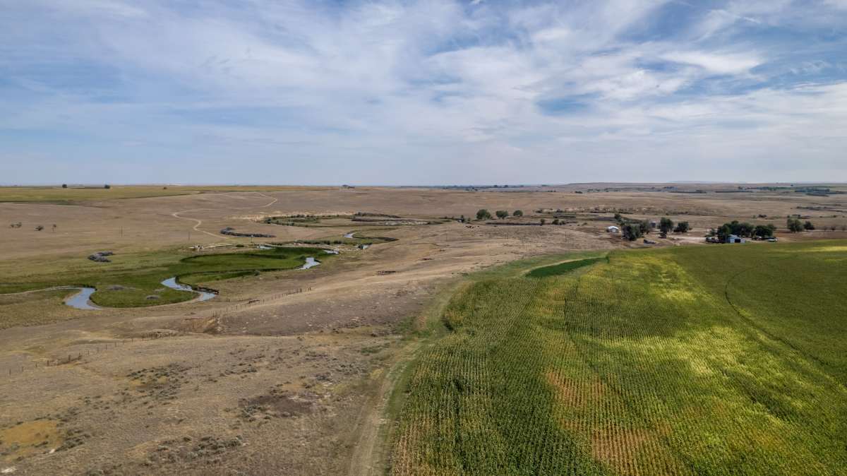 property_data/GTTFATO2wiZprw3LNnfB/pictures/Yoder Creek view.jpg