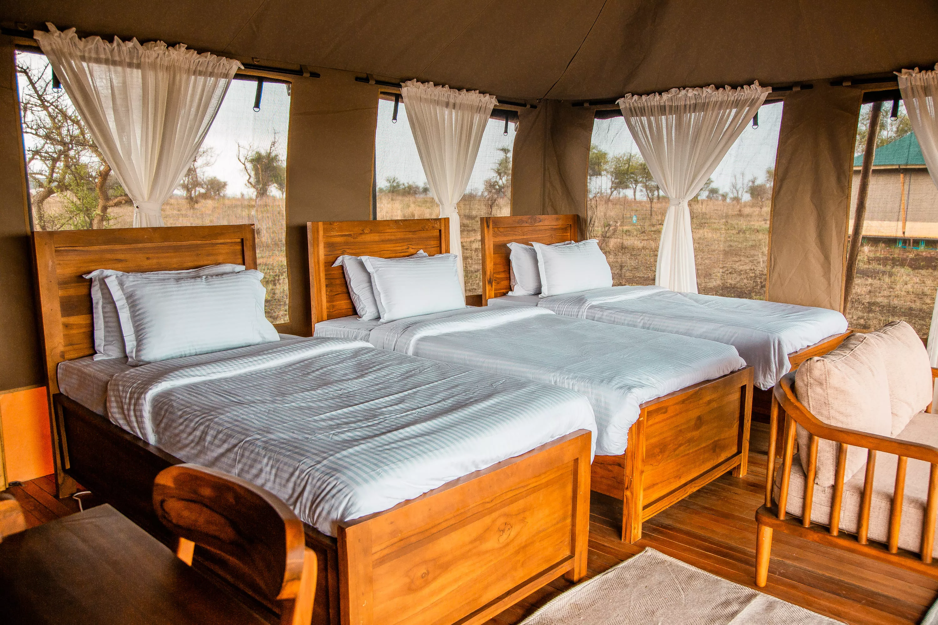 Canvas Suite Interior - Luxurious safari accommodation with handcrafted furnishings.
