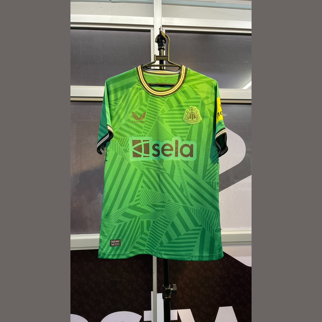 Newcastle Away Green 23 - 24