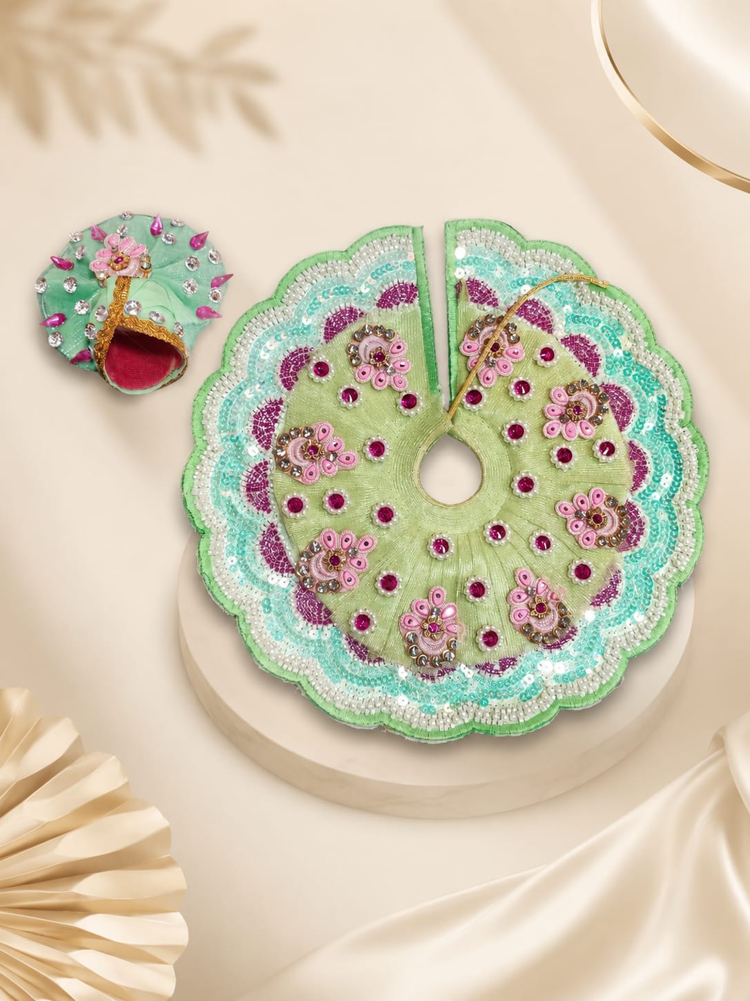 The Vasant Blossom Pista Green & Pink Handcrafted Laddu Gopal Poshak Set