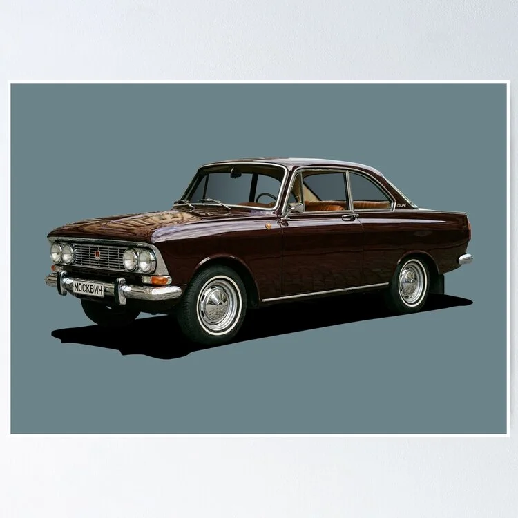 A Moskvitch 408 Elite GT Coupé design printed on a white ceramic mug, displayed on a wooden surface.