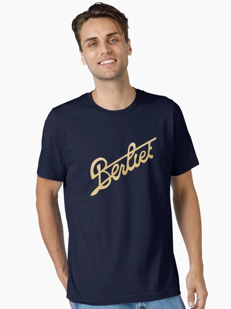 Man wearing a black baseball cap with the Berliet logo