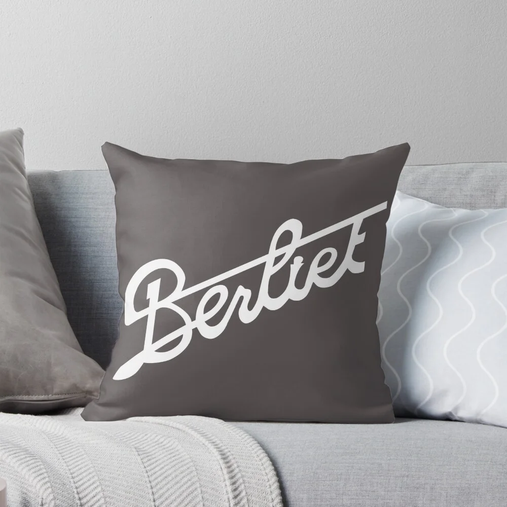 Dark grey throw pillow with the white Berliet logo