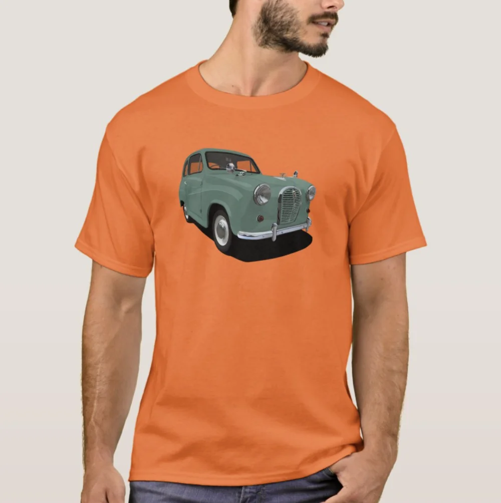 A man wearing an orange t-shirt with a graphic of a green Austin A35 on the front.