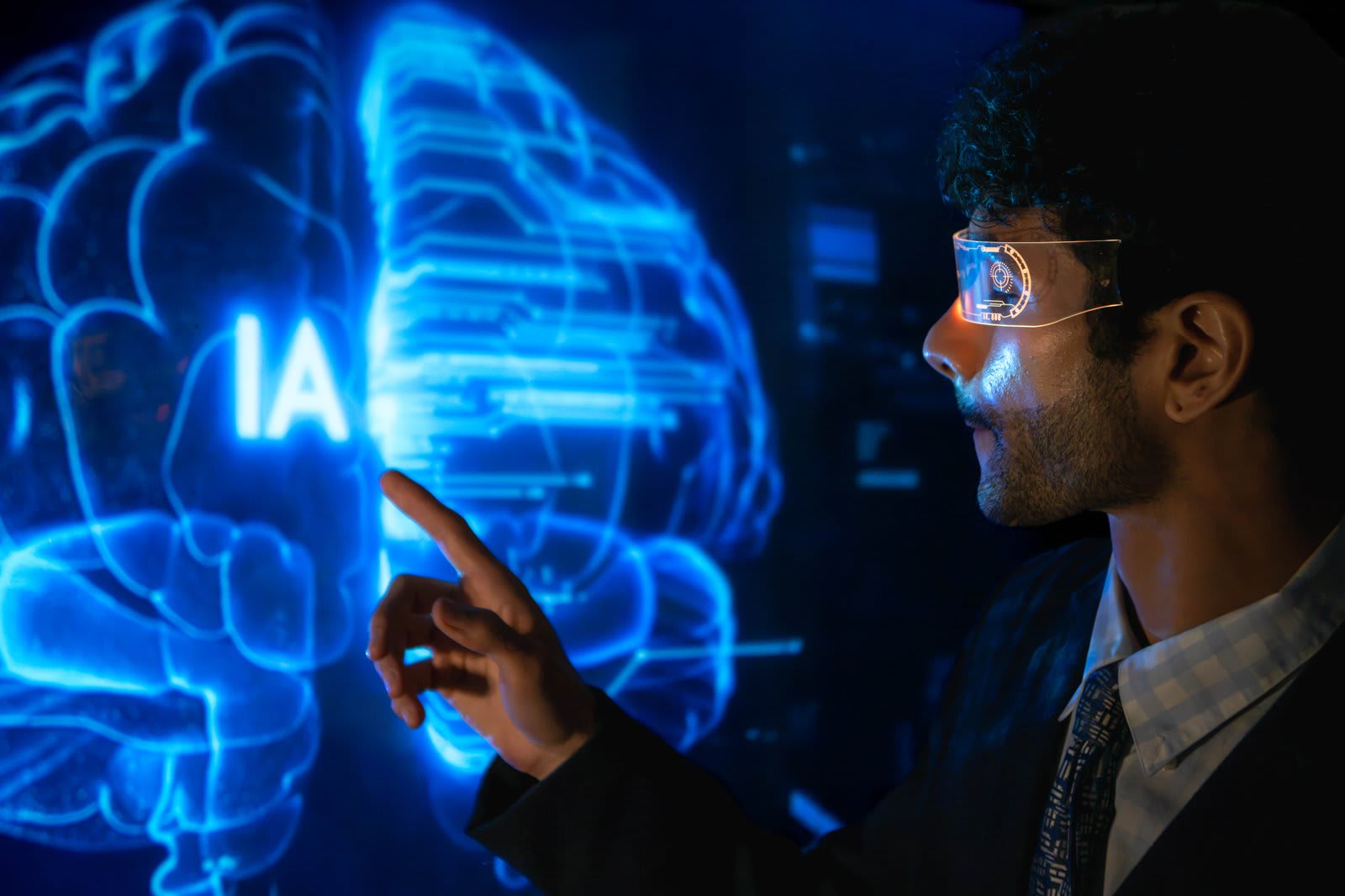 Professional working with a holographic AI brain model