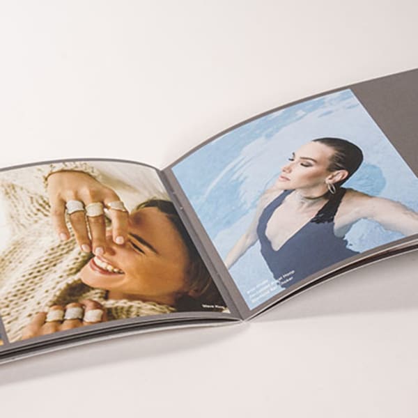 Saddle-stitched catalog laid open