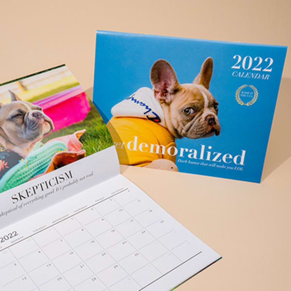 One open and one closed wall calendar