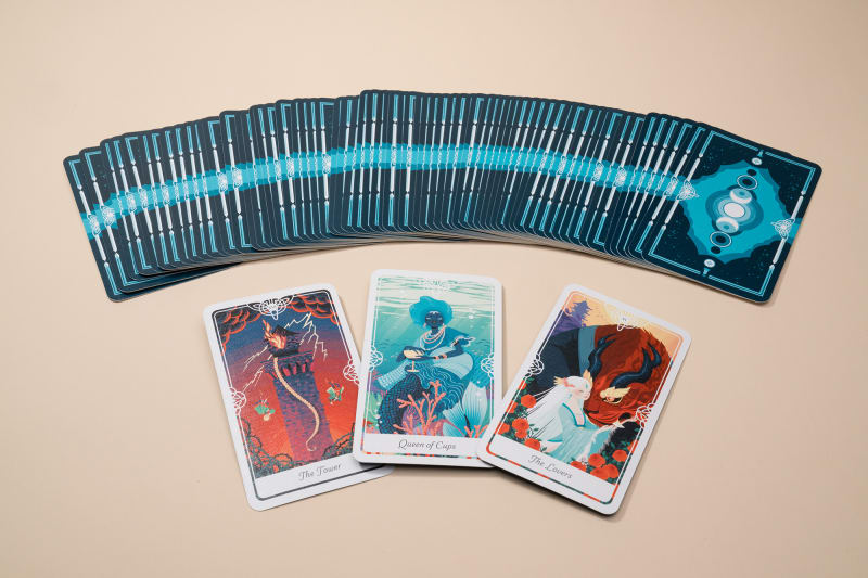 Row of tarot cards with three facing up
