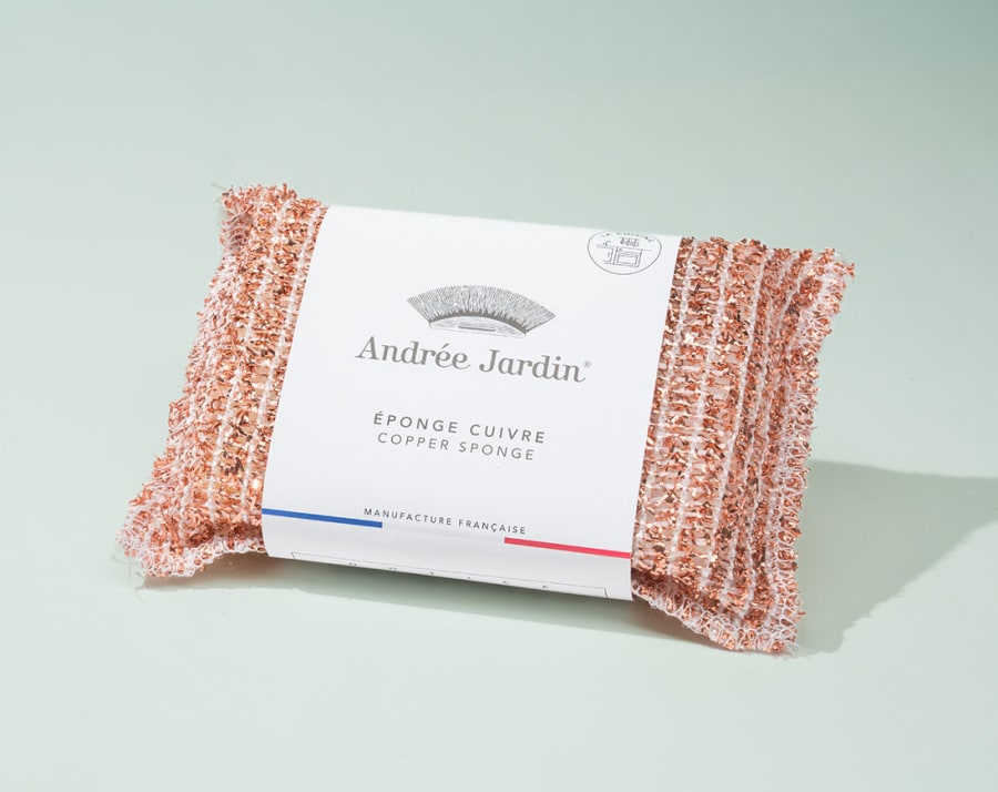 Copper sponge wrapped with retail packaging sleeve