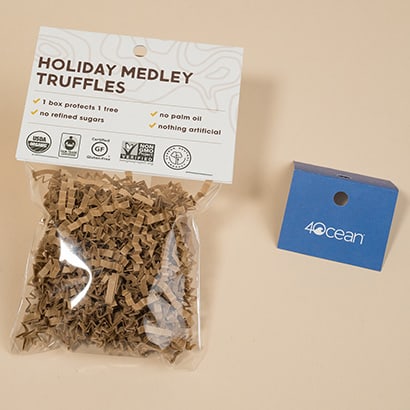 Header card attached to a plastic bag surrounded by unattached header cards