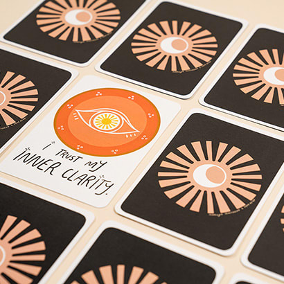 Spread of cards with one flipped over