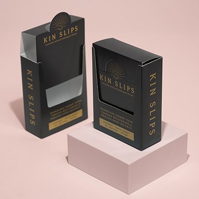 Pull out box packaging with one box pulled out and one box pushed in