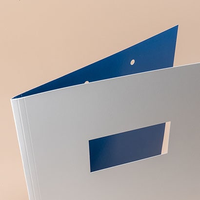 Real estate pocket folder with die cut rectangle on the front