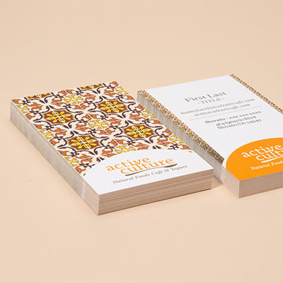 Two stacks of religious business cards