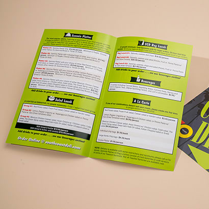 One open and one closed South Coast Deli menu brochure