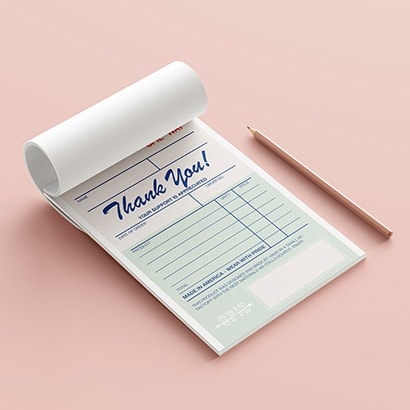 Restaurant receipt notepad with pink pencil