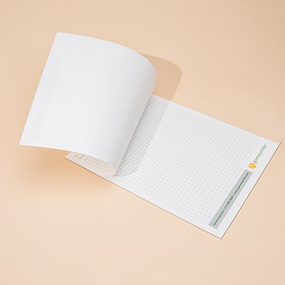 Greenerprinter notepad with one page lifted