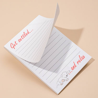 Teacher notepad with one page lifted